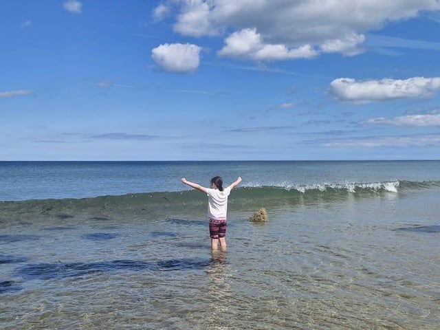 Out splashing in the sea!