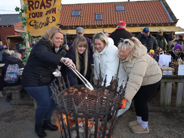 Roasting chestnuts at the Made in Whitby Christmas Festival. picture: Richard Ponter