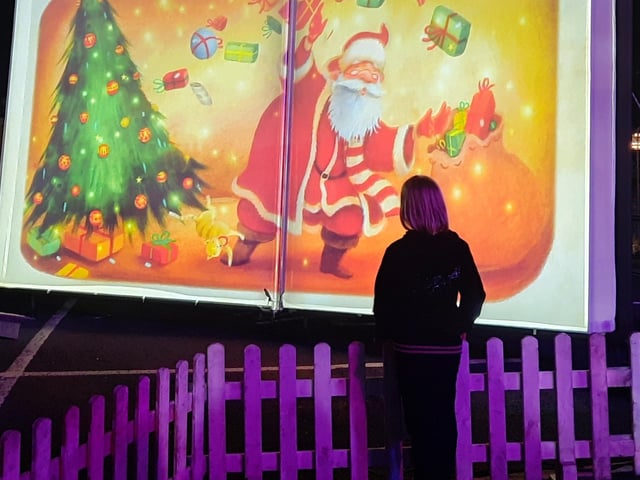Six-year-old Ashleigh looks at the giant storybook.
picture: Emma Atkins