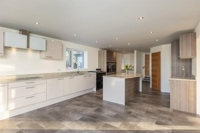 The modern kitchen with central island.