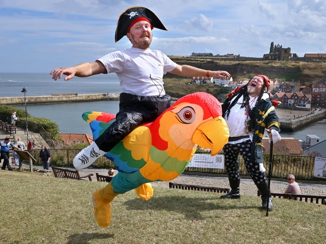 Is it a bird? No, it's a flying Pirate! Jack Stansfield with dad Gary. photo: Richard Ponter