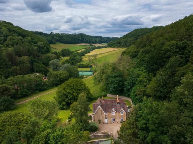 This six bedroom, two bathroom and four reception room detached house is currently for sale with Savills for offers over £1,195,000.