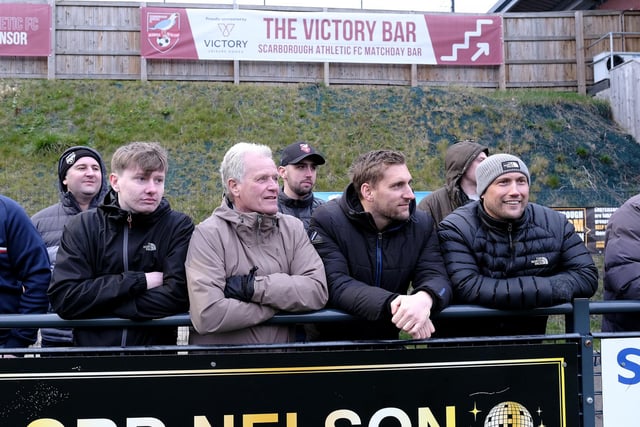 Scarborough fans concentrate on the action.