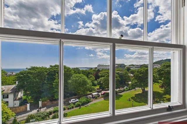 Many windows have stunning coastline views, as does this one in the kitchen.
