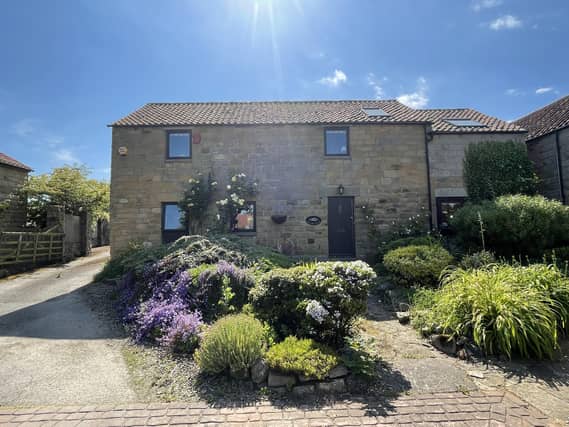 This lovely extended home offers flexible family accommodation over two floors.