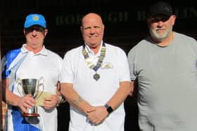 From left, East Coast of Yorkshire Crown Green Bowling Association Champion of Champions winner Paul Morgan, Association president Emmo Emmerson and runner-up Kevin Gates.