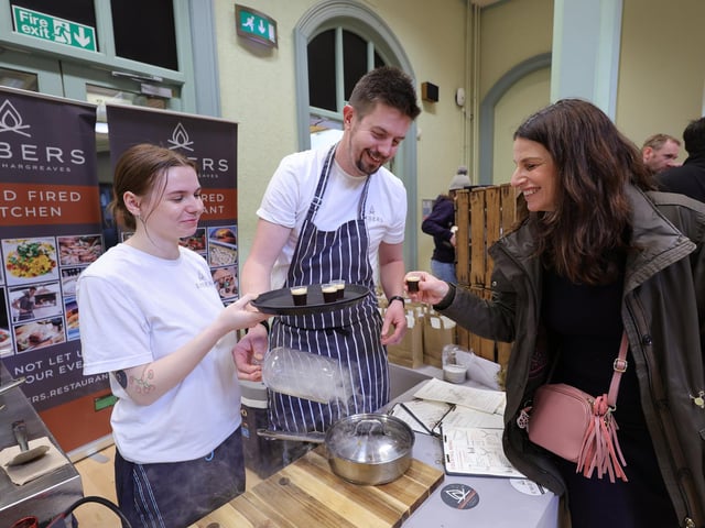 Sampling goods at the Embers stall