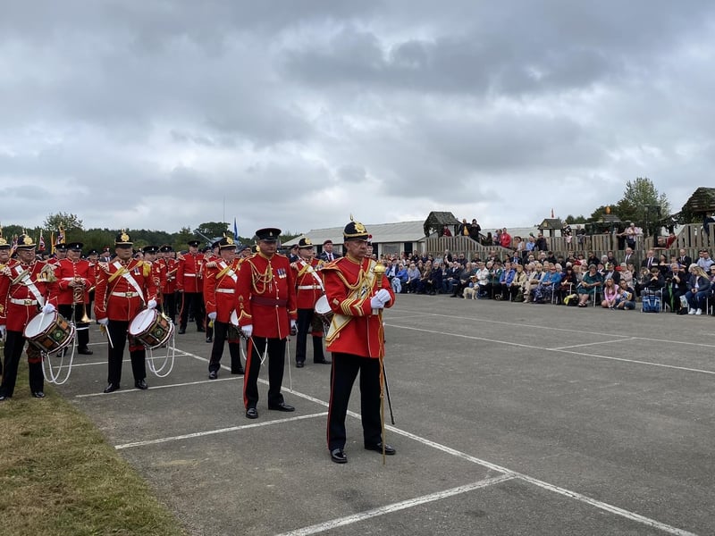 Crowds at the visitor attraction watch the parade.