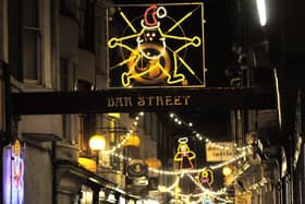 Scarborough's Christmas lights illuminate Bar Street in the town centre.