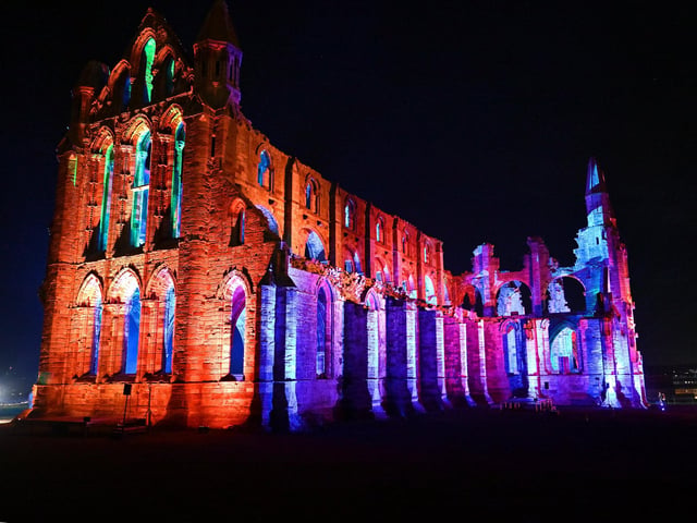 The abbey light up at night