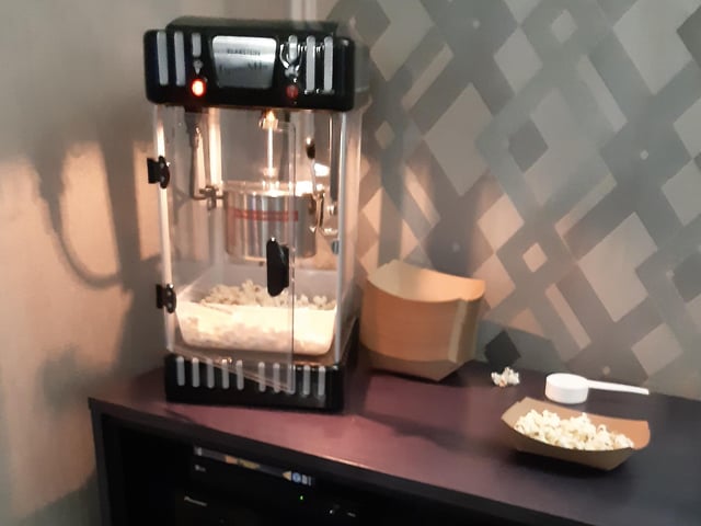 Popcorn maker in the cinema serving up tasty treats!
