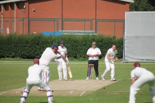 Pocklington opener Martin Stables hits out against Yapham's Jon Flint on his way to making 51. PHOTO BY PHILGILBANK