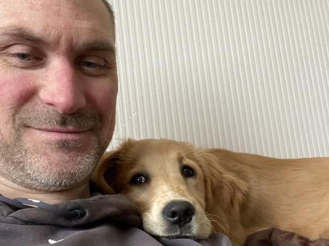 Dave and Cookie having a cuddle!