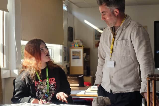 Mayor Skaith talks to an art student