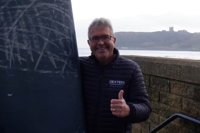 Steve McNamara, co-owner of the family-run Dexter's Surf Shop on North Bay.
