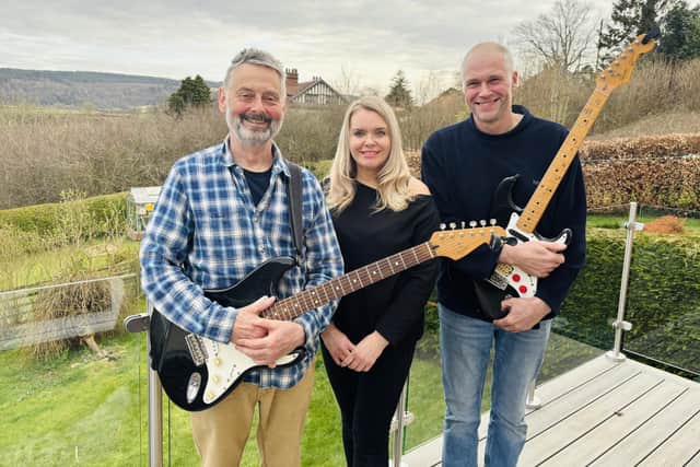 Singer Kelly Scott with Chris Padmore (left) and Mark Lees.