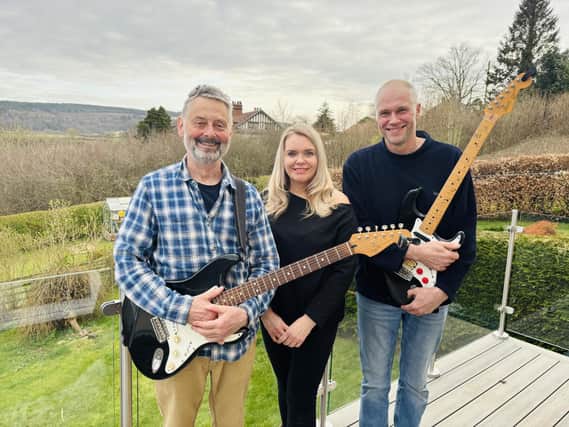 Singer Kelly Scott with Chris Padmore (left) and Mark Lees.