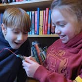 Max and Maya learning with micro:bits, which they borrowed from Scarborough Library. British Science Week is showcasing the STEM subjects of science, technology, engineering and maths.