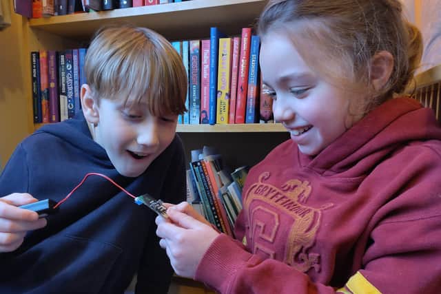 Max and Maya learning with micro:bits, which they borrowed from Scarborough Library. British Science Week is showcasing the STEM subjects of science, technology, engineering and maths.