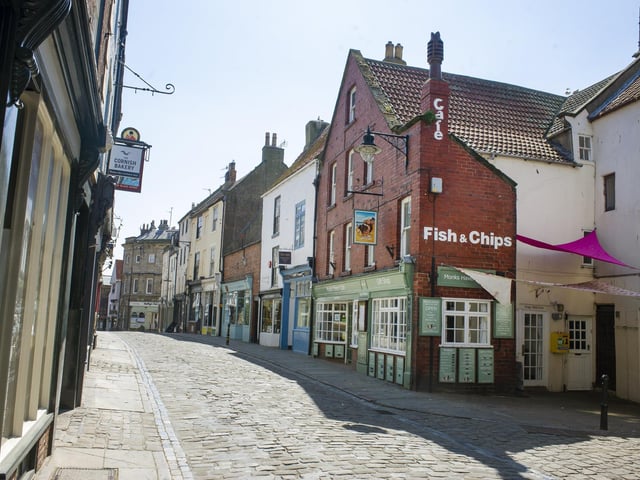 An eerily quiet Church Street, Whitby, which would otherwise have had thousands of people walking along it. Picture Tony Johnson