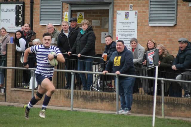Rob Boddy is roared on by Pocklington RUFC supporters as he sprints clear for the first try. PHOTO BY PHIL GILBANK