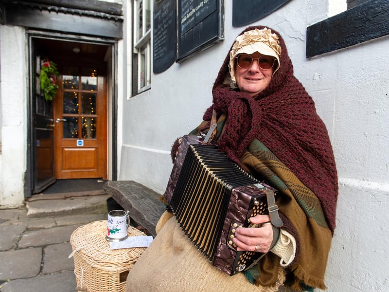 Pictured is Anna with her harmonium.