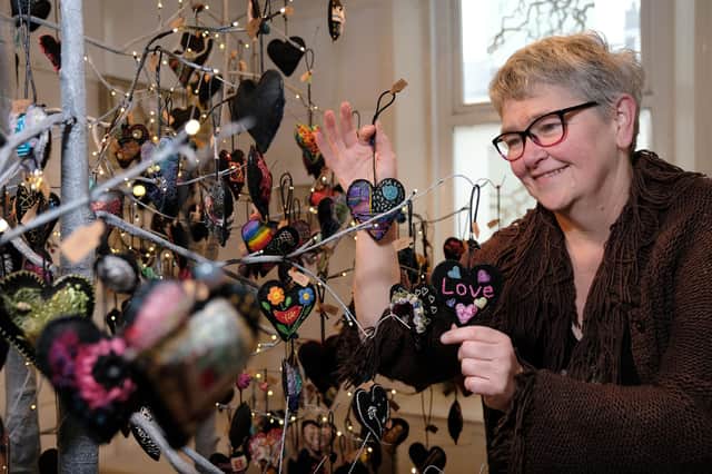 Artist Helen Birmingham with her new hearts project on display at her gallery in her home in Scarborough