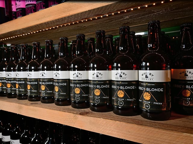 Shelves stocked with Whitby Brewery produce.