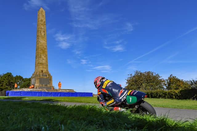 A rider approaches the war memorial at Olivers' Mount. Photo by Steve Gormley