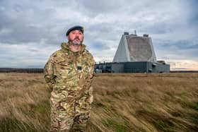 Date: 109th November 2022.
Picture James Hardisty.
RAF Fylingdales are celebrating 30 years of giant pyramid at North York Moors site. The 33 metre tall Solid State Phased Array Radar became operational in October 1992, after the iconic Golf Balls were removed, the main purpose of the base in to serve as an early warning Ballistic Missile Defense System. Pictured Patrolling the base U.K. Royal Air Force Flight lieutenant Richie Weeks.