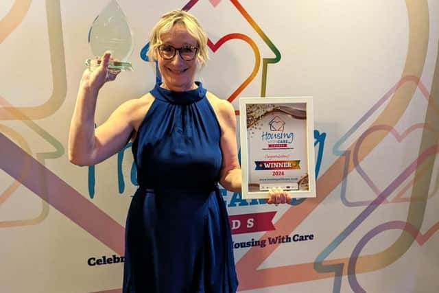 Liz Jones, Retirement Communities Manager at Jazz Court, celebrating her Housing with Care award win