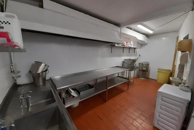 There is 'exceptional catering kitchen with separate food prep and pot-wash areas. Ample refrigeration and dry goods storerooms.