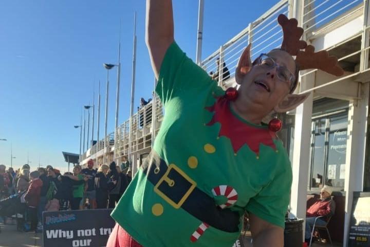 This elf is getting limbered up before the brave dash into the North Sea.