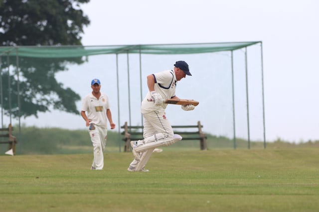 A Sewerby CC batter races through for a run.