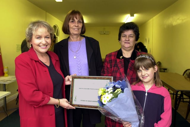 Doncaster Central MP Rosie Winterton presented a certificate to Barbara Dinnington, a commumnity service assistant with the Probation Service, watched by Miriam Parkinson, chair of the Friends of Grove Gardens, and Emma White, aged eight.