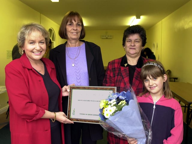 Doncaster Central MP Rosie Winterton presented a certificate to Barbara Dinnington, a commumnity service assistant with the Probation Service, watched by Miriam Parkinson, chair of the Friends of Grove Gardens, and Emma White, aged eight.