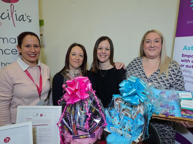 The St Cecilia's team with their partner team member from Asters