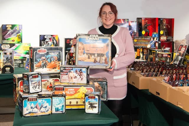 Chloe Mckenna with the Star Wars collection that started with a 1983 Christmas present.