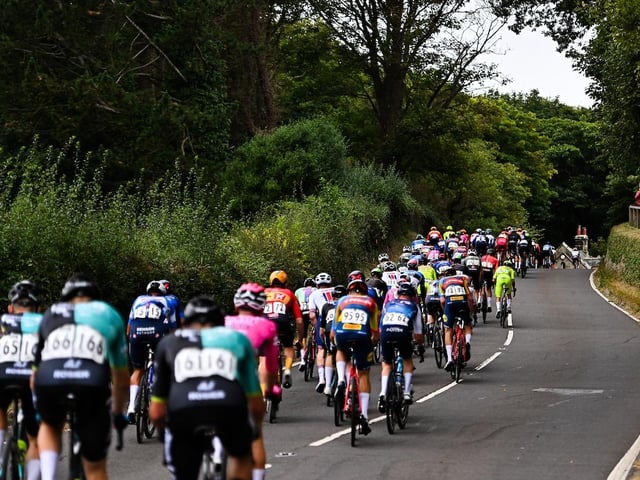 Cyclists on the gruelling ascent up Lythe Bank.