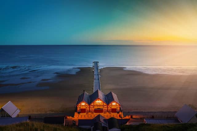Clifftop twilight view of the pier at Saltburn by the Sea in North Yorkshire