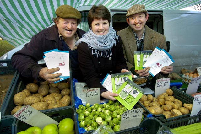 Flixton farmers Stanley (L) and David Johnson, and Carolyn Jackson of Wykeham Estates, launching Scarborough local produce guides at the Wykeham Farmers' Market.