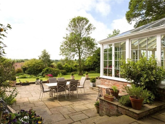 This terrace is accessible from the conservatory.