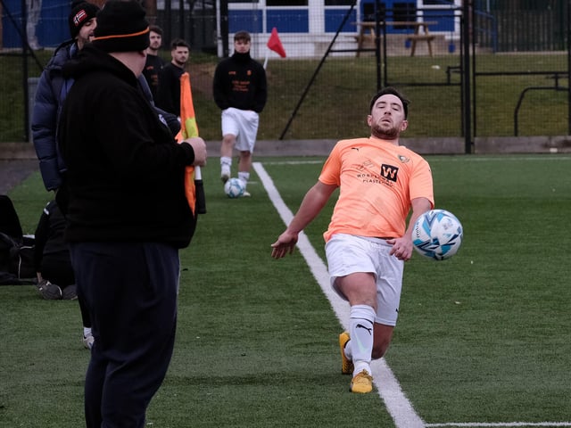 Joel Ramm is at full stretch to try to keep the ball in play for Edgehill in the cup quarter-final