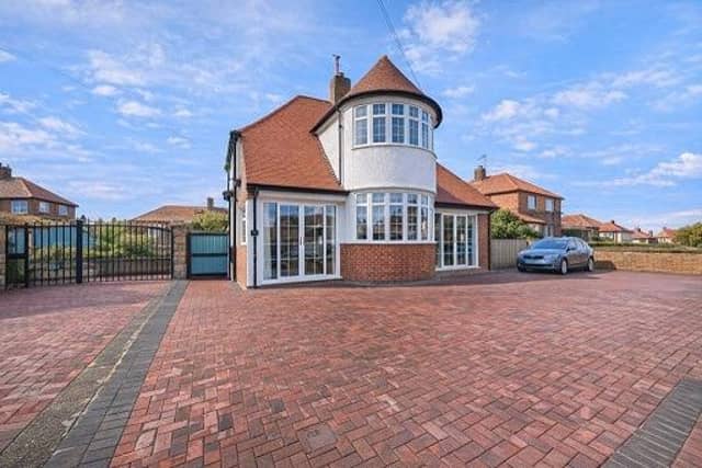 This family home for sale in Whitby stands in an elevated position within a large plot.