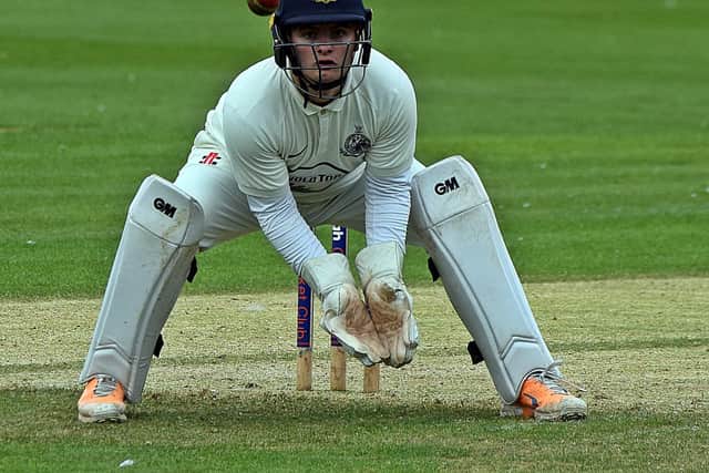 Scarborough 2nds wicketkeeper Jack Ingle keeps his eye on the ball.