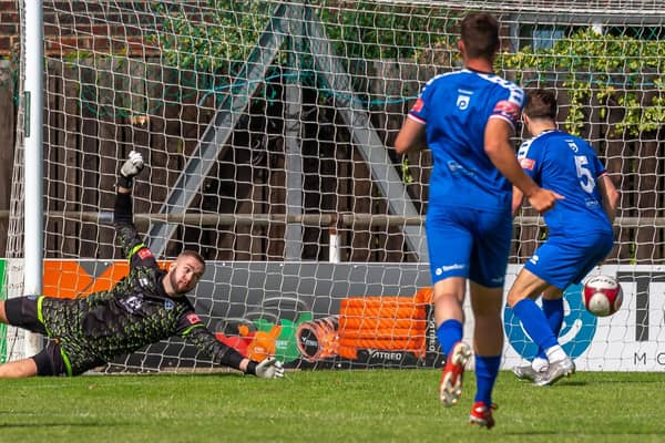 Whitby Town keeper Nicholas Cranston saves a Beverley Town shot in the first Blues game of the pre-season.