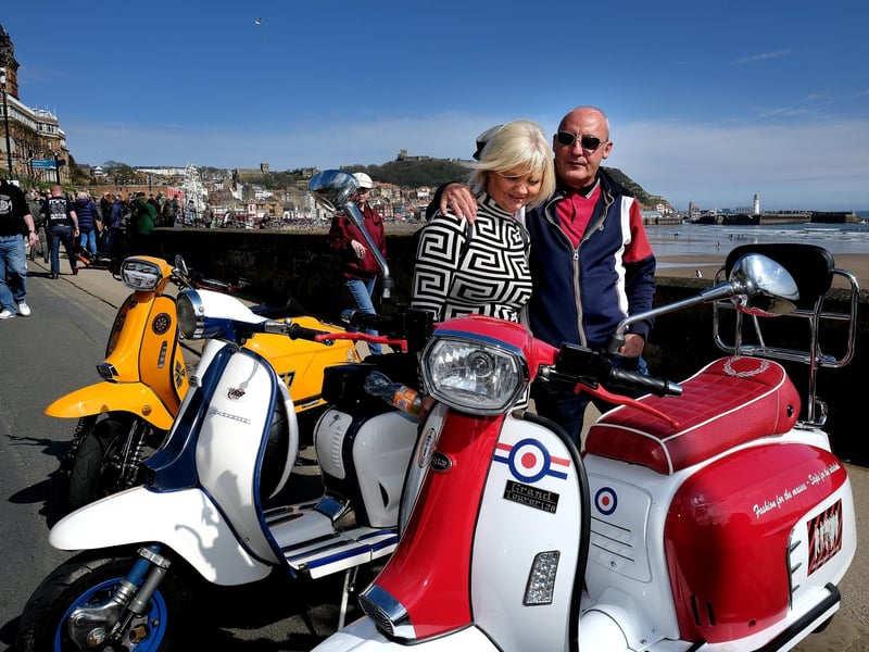 Admiring the scooters.