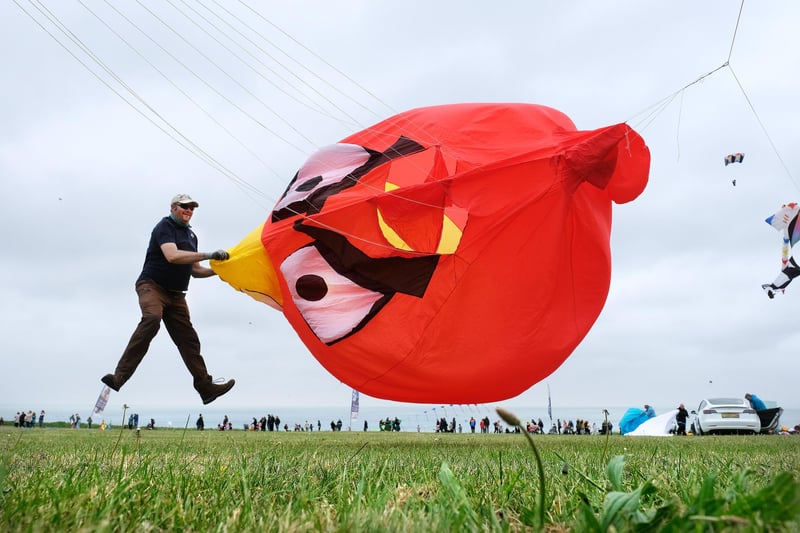 Andy Clayton sets his kite into the sky.