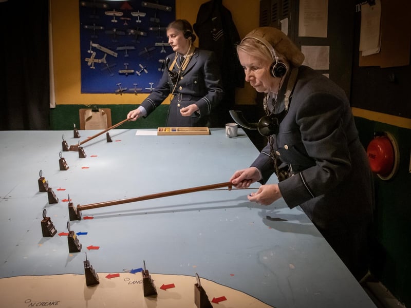 Reenactors planning their attack in the recreated Bomber Command war room.