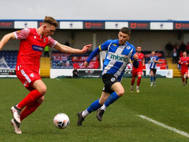 Boro striker Jake Charles pushes on.